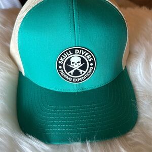 Pacific baseball style SnapBack teal/white hat.  85% polyester 35% cotton